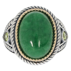 Oval green jadeite sterling silver ring with accent gemstones, showcasing luxurious elegance and craftsmanship.