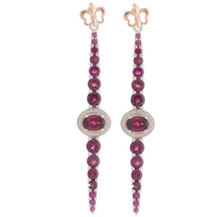 Oval purple garnet sterling silver earrings with accent, featuring sparkling gemstones and elegant design.
