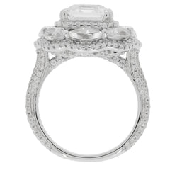 Emerald white moissanite sterling silver ring showcasing a stunning design with multiple sparkling gemstones.