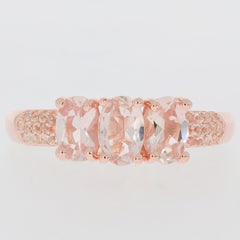 Oval pink morganite sterling silver ring with accent stones, showcasing elegant craftsmanship and luxurious design.