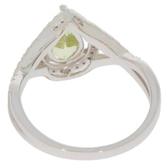 Green Peridot and diamond accent 14K white gold ring, elegant design showcasing a teardrop gemstone.