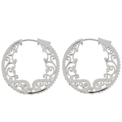 Elegant sterling silver hoop earrings with intricate swirl design and polished finish.