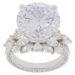 Round white Moissanite sterling silver ring with accent gemstones, showcasing brilliance and elegance.