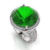 Green Emerald Sterling Silver Ring with accent stones, showcasing luxury and elegance in a beautiful design.