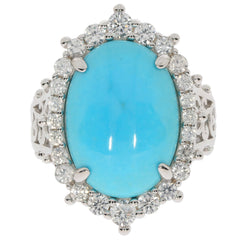Elegant oval blue turquoise sterling silver ring adorned with sparkling gemstones for sophisticated style.