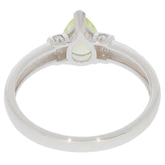 View of a Green Peridot 14K White Gold Ring with diamond accents from the back, showcasing its elegant design.