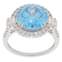 Round blue topaz sterling silver ring with sparkling accents, showcasing elegant gemstone brilliance.