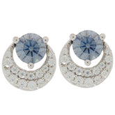 Elegant silver earrings featuring blue gemstones and sparkling cubic zirconia accents, perfect for any special occasion.