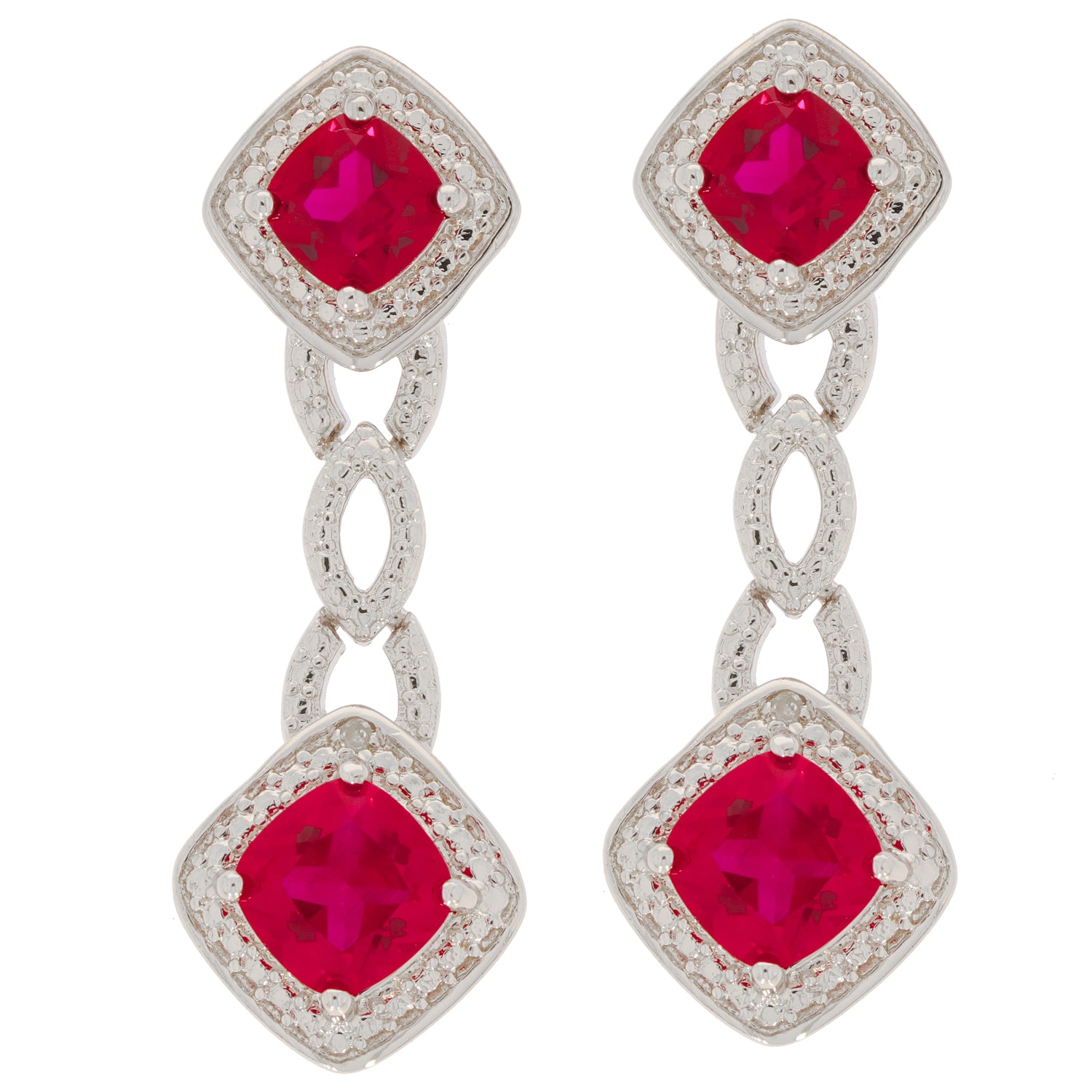 Cushion red ruby sterling silver earrings with accents, showcasing elegant design and sparkling gemstones.