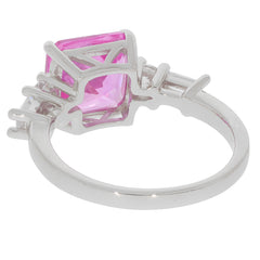 Emerald Purple Sapphire Sterling Silver Ring showcasing a brilliant pink gemstone set in an elegant band.