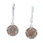 Elegant sterling silver earrings featuring a circular design with sparkling red diamond accents.