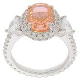 Elegant pink Morganite sterling silver ring with sparkling accents, perfect for any sophisticated jewelry collection.