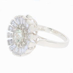 Round green amethyst sterling silver ring with sparkling accent stones, showcasing elegance and luxury.