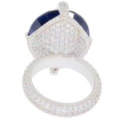 Oval blue sapphire ring in sterling silver with sparkling accents, showcasing elegant craftsmanship and luxury.