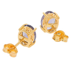Oval purple sapphire sterling silver earrings with elegant gold settings and intricate design, perfect for stylish occasions.