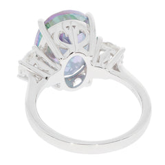 Oval Mystic Topaz Sterling Silver Ring showcasing a sparkling gemstone from the side, highlighting its elegant design.