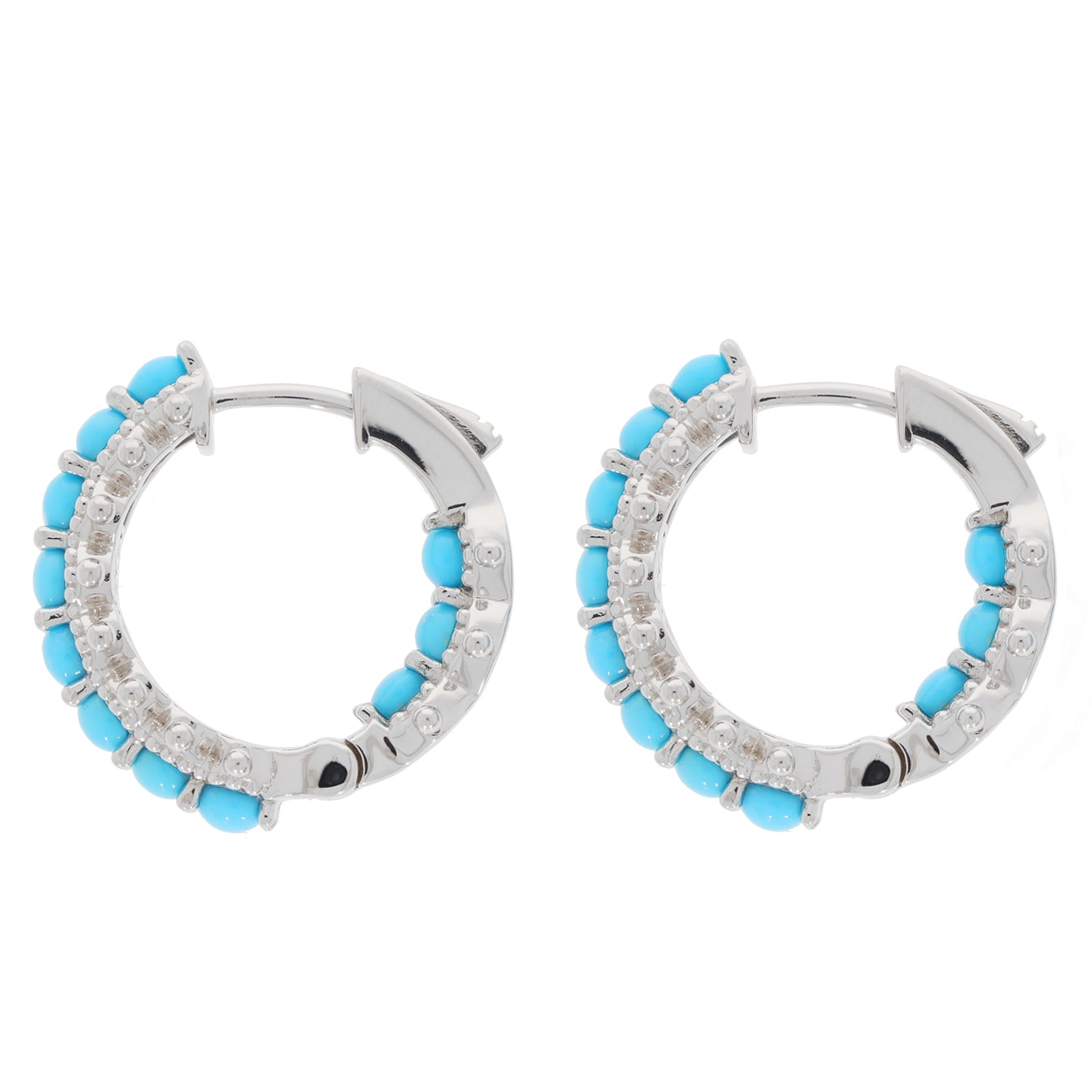 Round blue turquoise sterling silver earrings with sparkling accents, showcasing elegant craftsmanship.