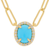 Blue turquoise sterling silver necklace with gold accent and sparkling gem details.