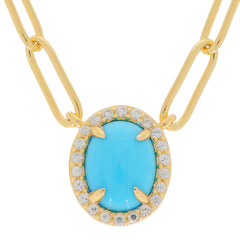 Blue turquoise sterling silver necklace with gold accent and sparkling gem details.