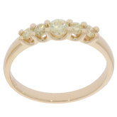 Elegant 14K yellow gold ring featuring a round diamond and sparkling accents, perfect for luxurious jewelry collections.