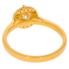 14K yellow gold ring with round white diamond accent, showcasing luxury and elegance.