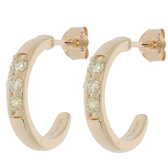 Round green diamond 14K yellow gold earrings featuring sparkling accents for an elegant look.