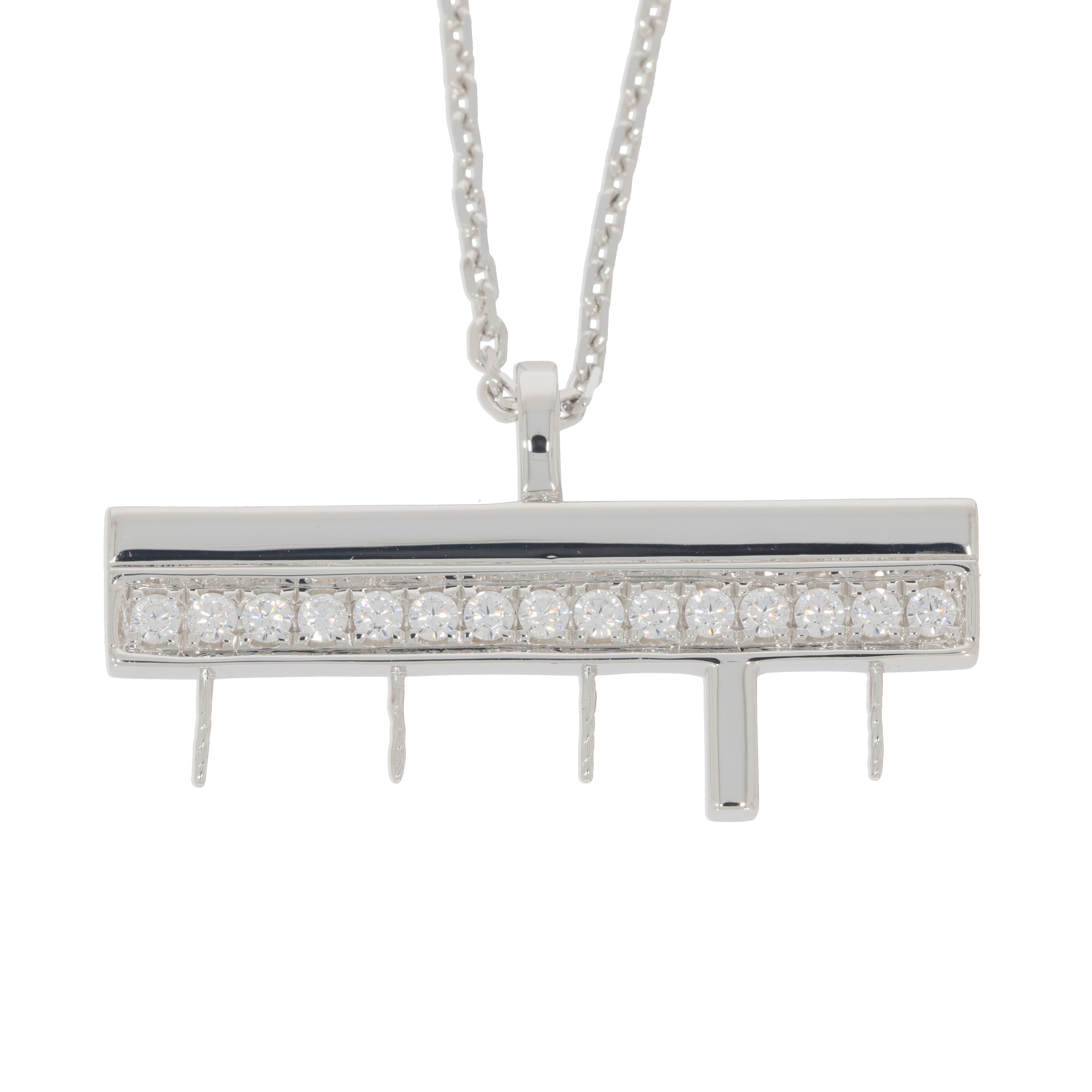 Elegant white diamond sterling silver pendant on a delicate chain, showcasing sparkling gemstones.