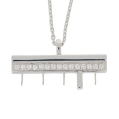 Elegant white diamond sterling silver pendant on a delicate chain, showcasing sparkling gemstones.