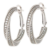 Elegant round white diamond sterling silver earrings with accent, featuring sparkling gemstones for a luxurious look.