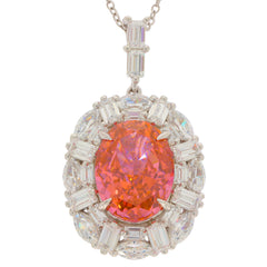 Oval orange sapphire sterling silver pendant with sparkling accents for elegant style and luxury.