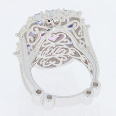 Intricate design of an oval pink topaz sterling silver ring showcasing elegant filigree details.