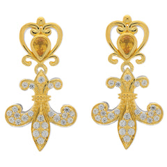 Elegant yellow sapphire and diamond accent sterling silver earrings in a floral design.
