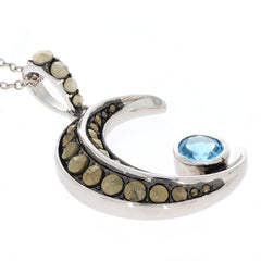 Round Blue Topaz Sterling Silver Pendant with shimmering accents, perfect for elegant jewelry collections.