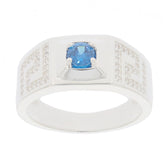 Round blue moissanite sterling silver ring with geometric design and sparkling accents.