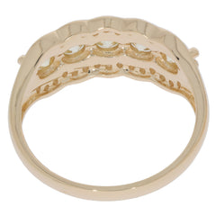 Back view of a Round Green Diamond 14K Yellow Gold Ring showcasing intricate detailing and elegance.