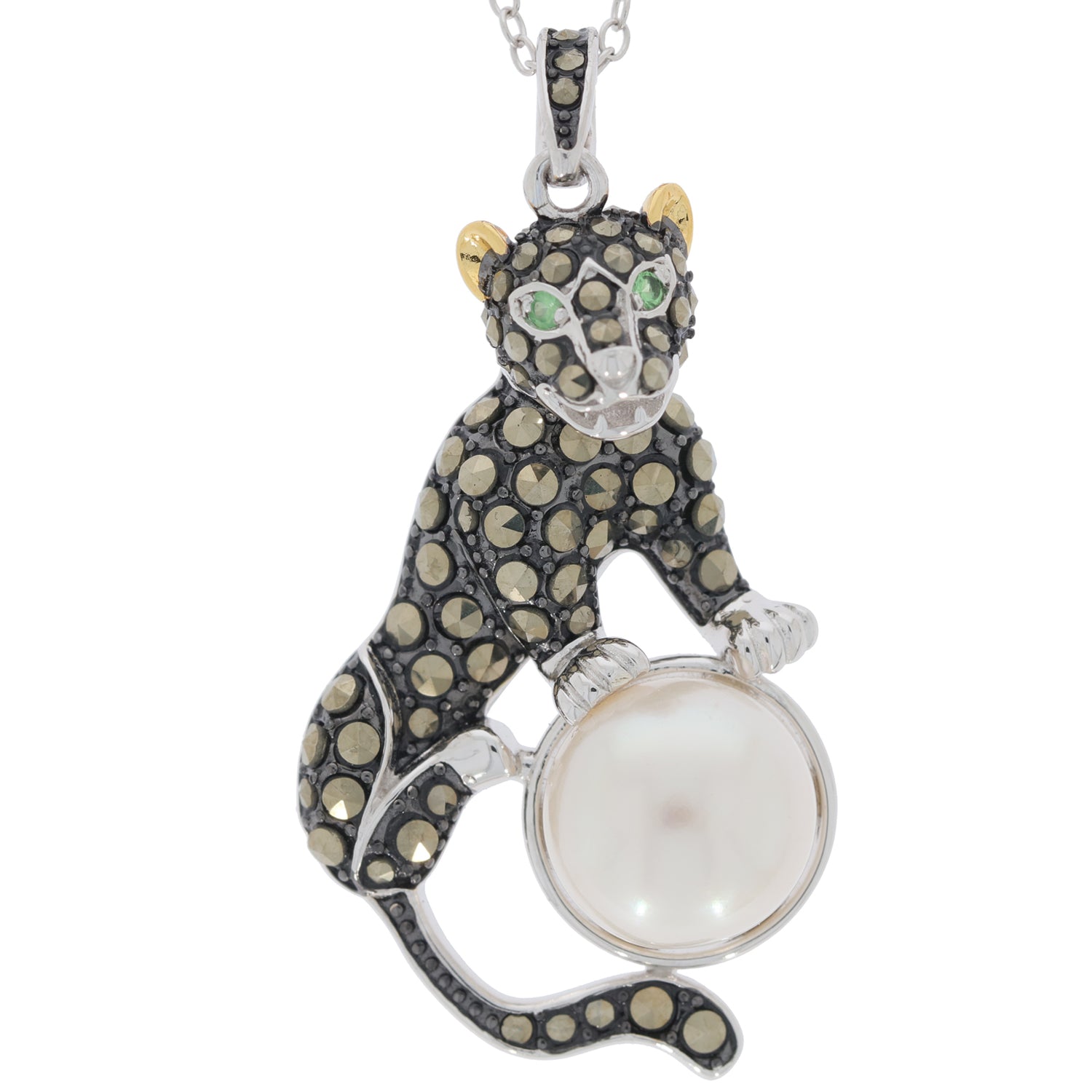 Black and gold leopard pendant holding a white pearl, featuring gemstone accents, perfect for elegant jewelry collections.