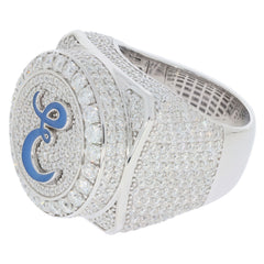 Elegant silver ring with blue accent and sparkling diamond-like stones, perfect for luxury jewelry collections.