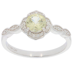 14K white gold ring featuring a yellow gemstone center and diamond accents, perfect for elegant attire.