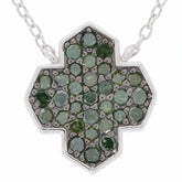 Green Diamond Sterling Silver Necklace featuring a unique cross design with sparkling green gemstones.