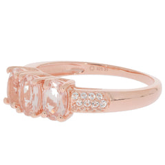 Oval pink Morganite sterling silver ring with sparkling accents, elegant jewelry for sophisticated style.