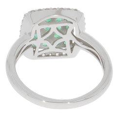 Back view of a Green Emerald Sterling Silver Ring, showcasing intricate design and sparkling gemstones.