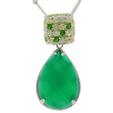 Elegant Pear Green Jadeite Sterling Silver Pendant with sparkling gemstone accents.