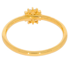 Elegant gold ring with a simple band and intricate design, perfect for special occasions or daily wear.