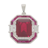 Elegant Red Ruby Sterling Silver Pendant with accent stones, showcasing exquisite craftsmanship and luxury.