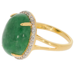 Oval green jadeite sterling silver ring with sparkling accents, showcasing luxury and elegance in jewelry.