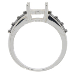 Back view of an oval red garnet sterling silver ring with accent stones, showcasing its elegant design.