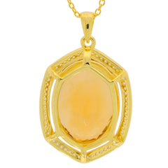 Oval yellow citrine sterling silver pendant with elegant design and sparkling gemstone accent.