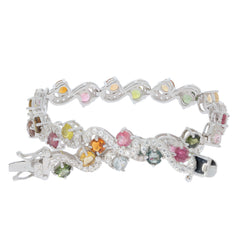 Round multiple color tourmaline sterling silver bracelet with sparkling gemstone accents.