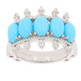 Oval blue turquoise sterling silver ring with five gemstones, elegant and stylish jewelry piece.