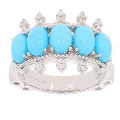 Oval blue turquoise sterling silver ring with five gemstones, elegant and stylish jewelry piece.